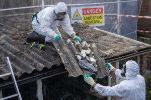 asbestos experts removing materials from building