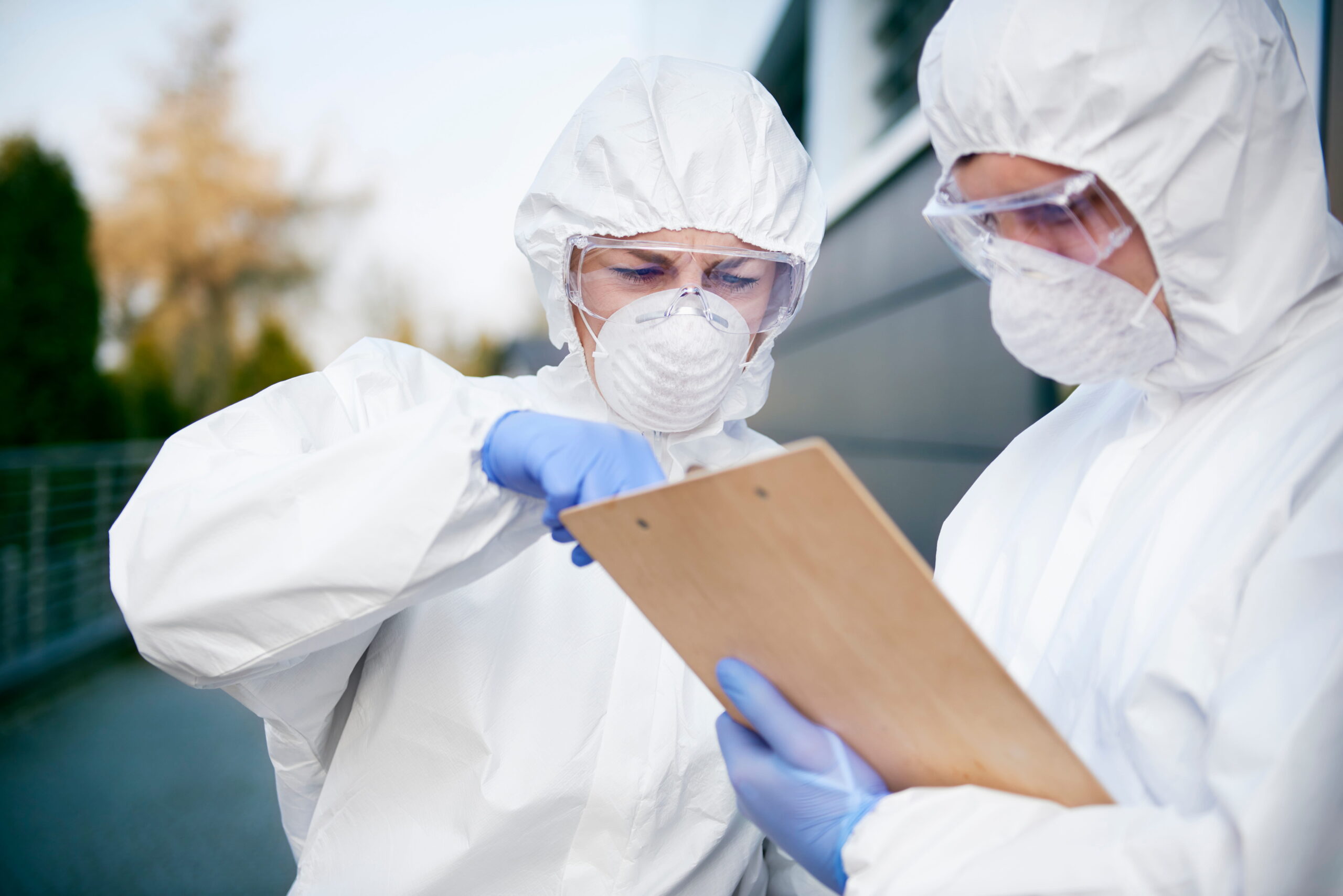 asbestos professionals collaborating on important work